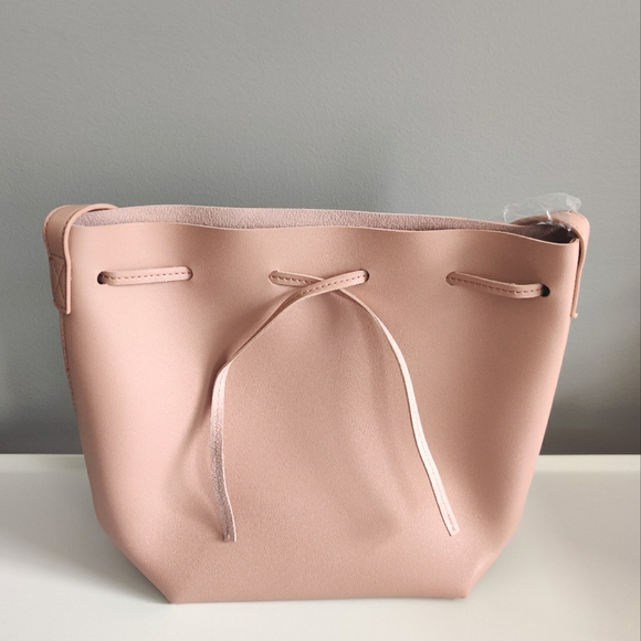 Kayla + Ava cross body bucket bag in blush pink - Picture 3 of 8